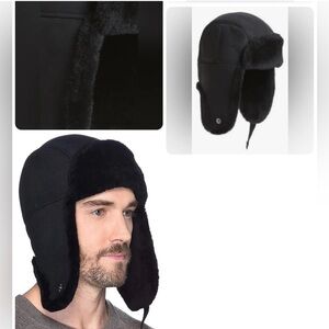 UGG Black GENUINE SHEEPSKIN
SHEARLING TRAPPER HAT BLACK SIZE S/M